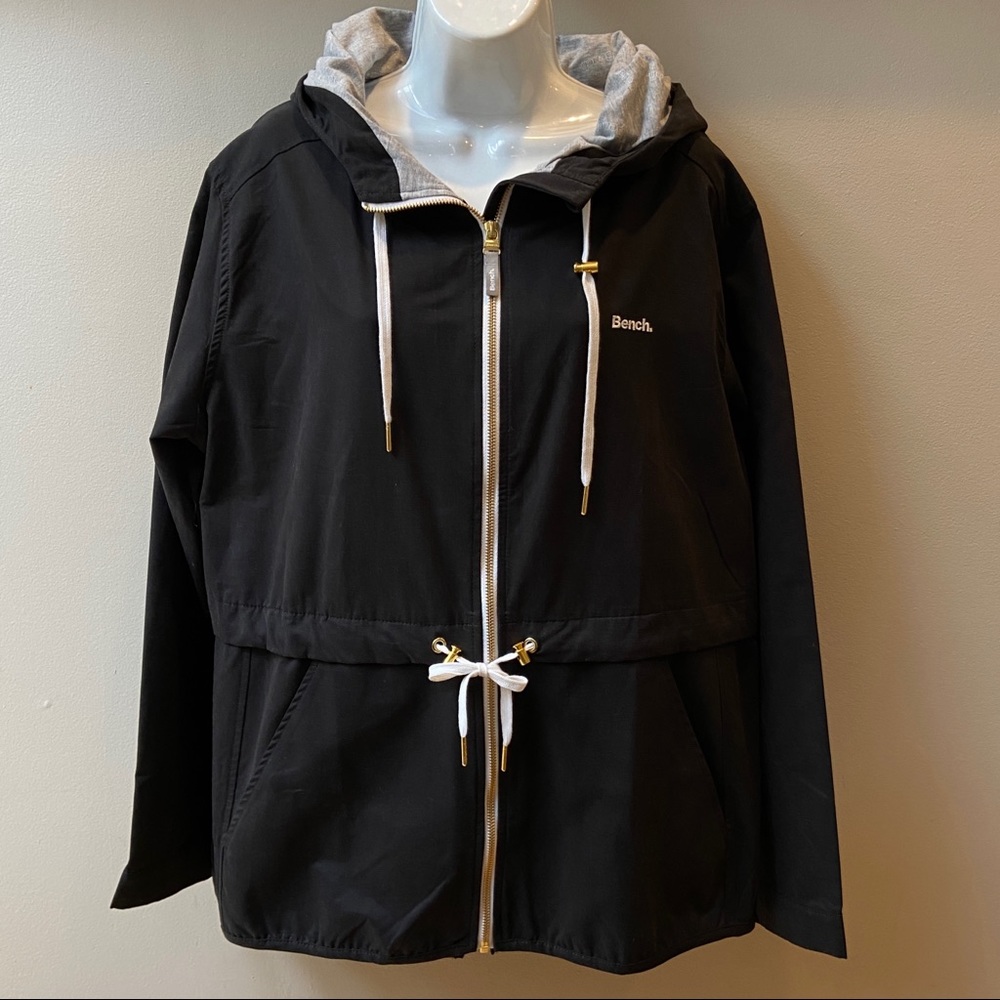 Bench Wind Breaker Coat Black with Gold tone zipper accent. Drawstring waist. XL